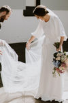 Scoop Neckline Half Length Sleeve Crepe Bridal Gown With Sash