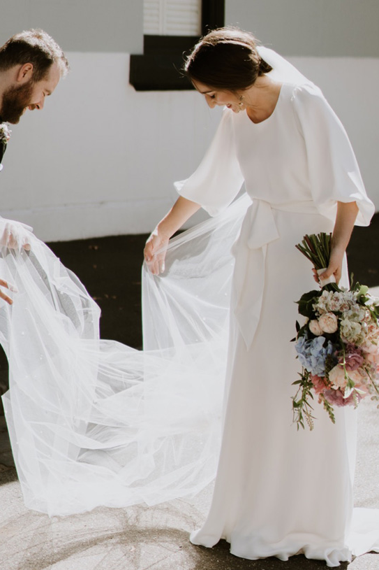 Scoop Neckline Half Length Sleeve Crepe Bridal Gown With Sash