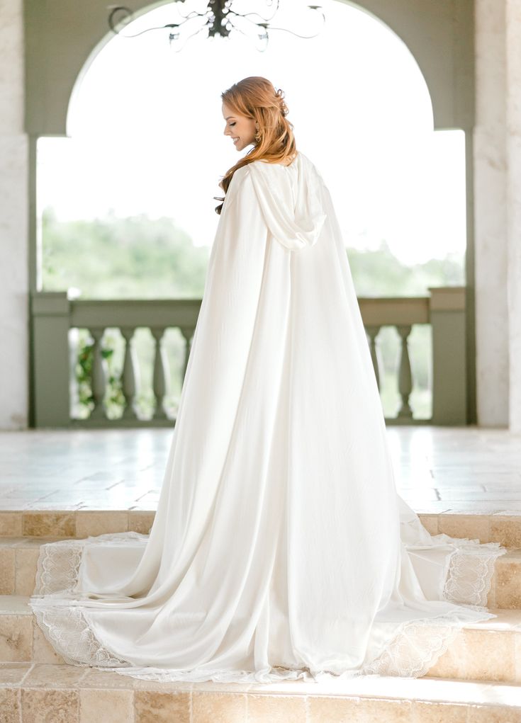 long white cape dress Coast Women's Maxi Wedding in Ivory | Size: 10 sweeping cape detail creates a regal silhouette for your special day Elegant round neckline frames the dcolletage beautifully Sleek maxi length design offers a contemporary take on bridal elegance Streamlined fit with subtle stretch ensures comfort throughout your celebration Flowing cape overlay adds movement and dimension as you walk down the aisle Make a striking statement on your wedding day with this sophisticated cape maxi dress from Coast BRIDAL CAPE with hood off