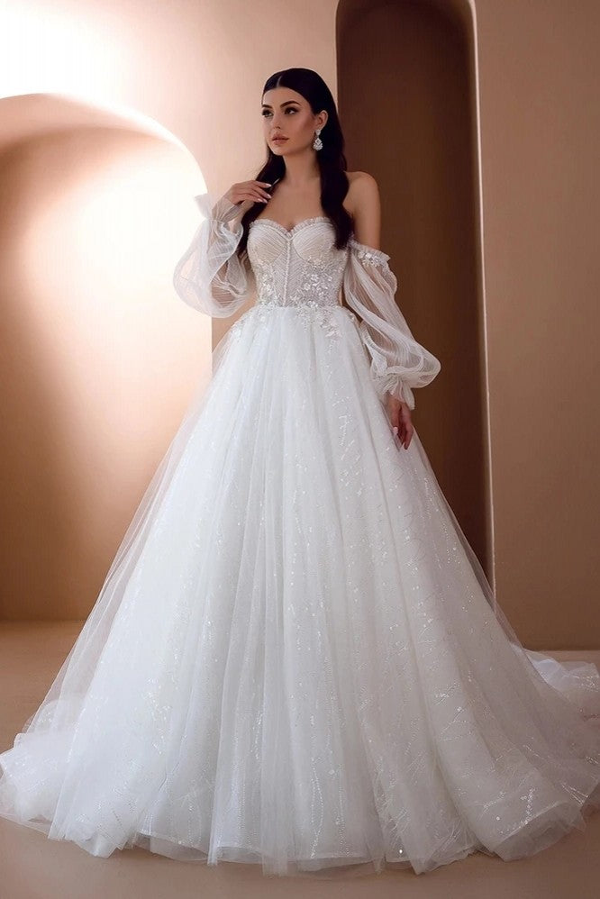 Strapless A-line wedding dress with removable sleeves