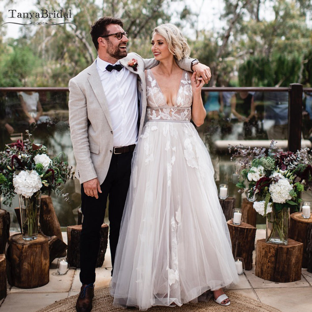 Deep V-Neck Sleeveless A Line Backless Beach Wedding Dresses Noivas DW TANYA BRIDAL Deep V-Neck Sleeveless A Line Backless Beach Wedding Dresses Noivas DW TANYA BRIDAL