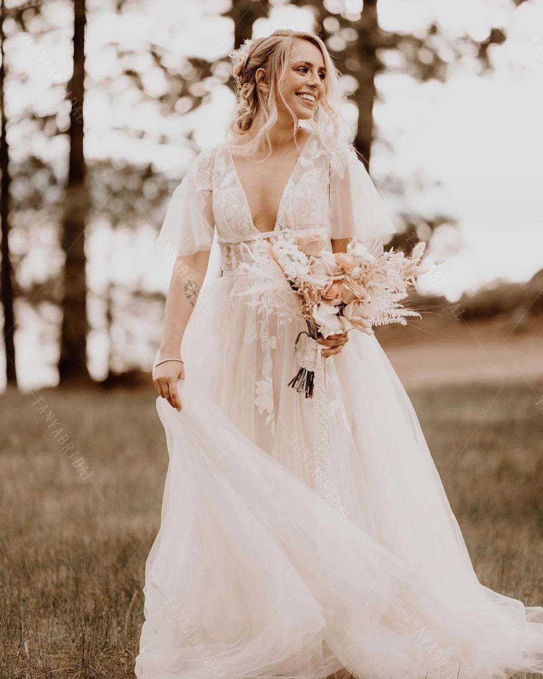 bohemian romantic wedding dresses Romantic Flowy Boho Lace Wedding Dress