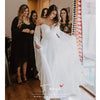 White Bohemian Wedding Dresses Spaghetti Backless Long Sleeve Sweep Train Chiffon Appliques Beach Country Bridal Gowns